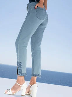 Push-up-Jeans mit Blüten-Applikation