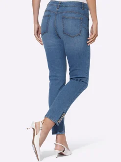 Push-up-Jeans mit Ösen- und Kettenverzierung